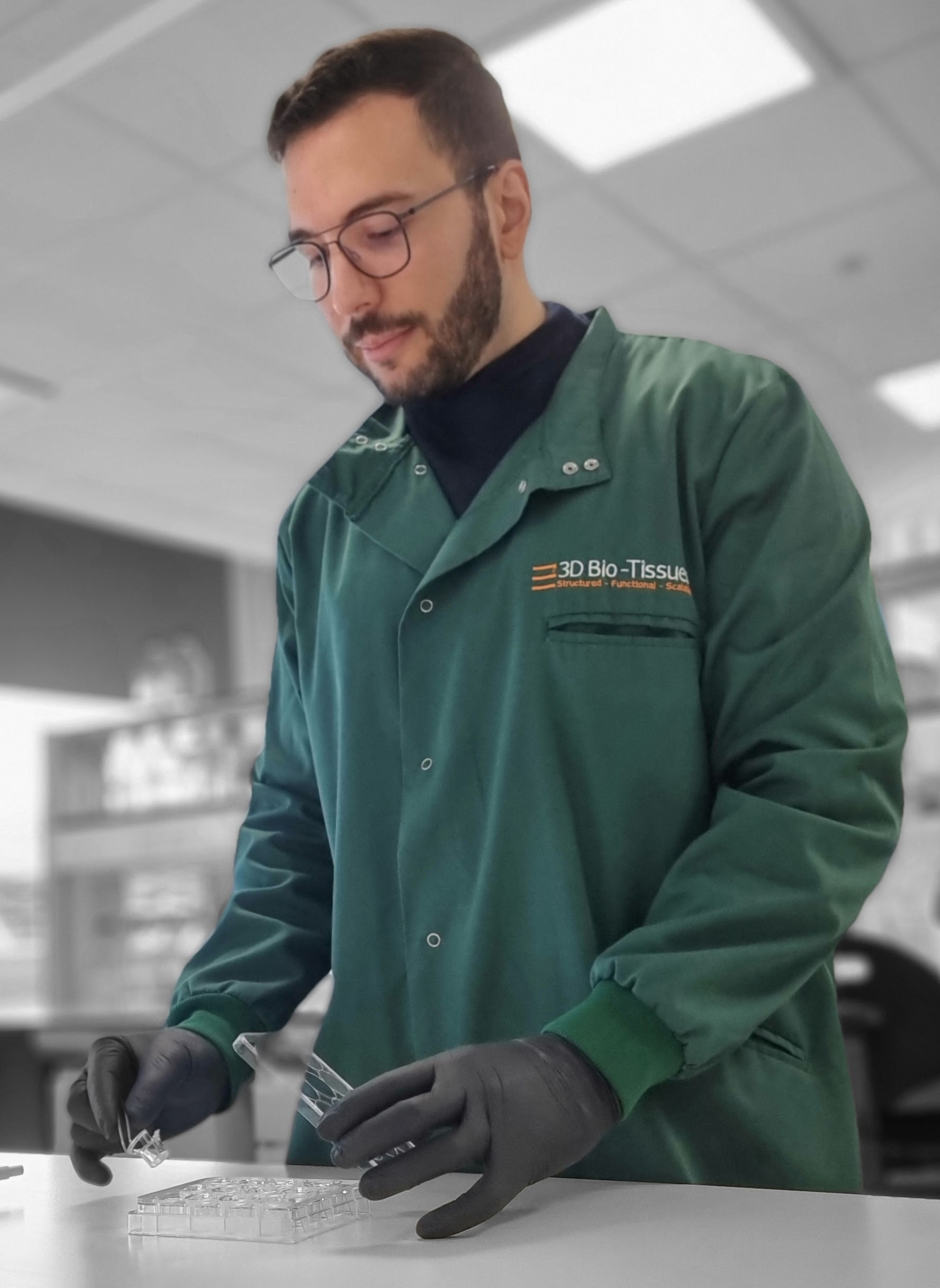 Man in lab using Keratox to evaluate ocular toxicity profile of chemical formulations.